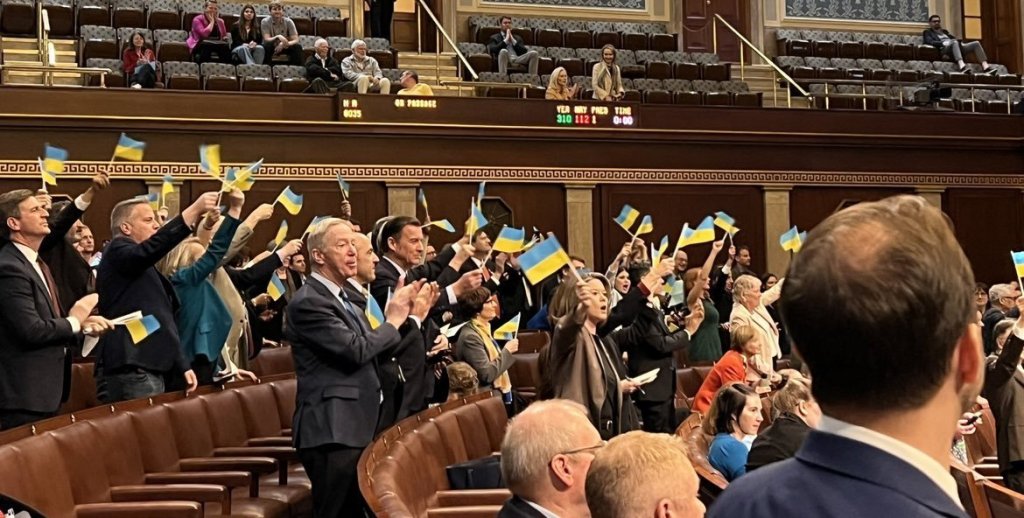 American politicians wave Ukrainian flags after passing another aid bill for&nbsp;Ukraine